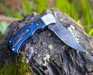Folding handmade damascus knife with proper design for comfortable grip for daily use, easy to carry, camping adventure